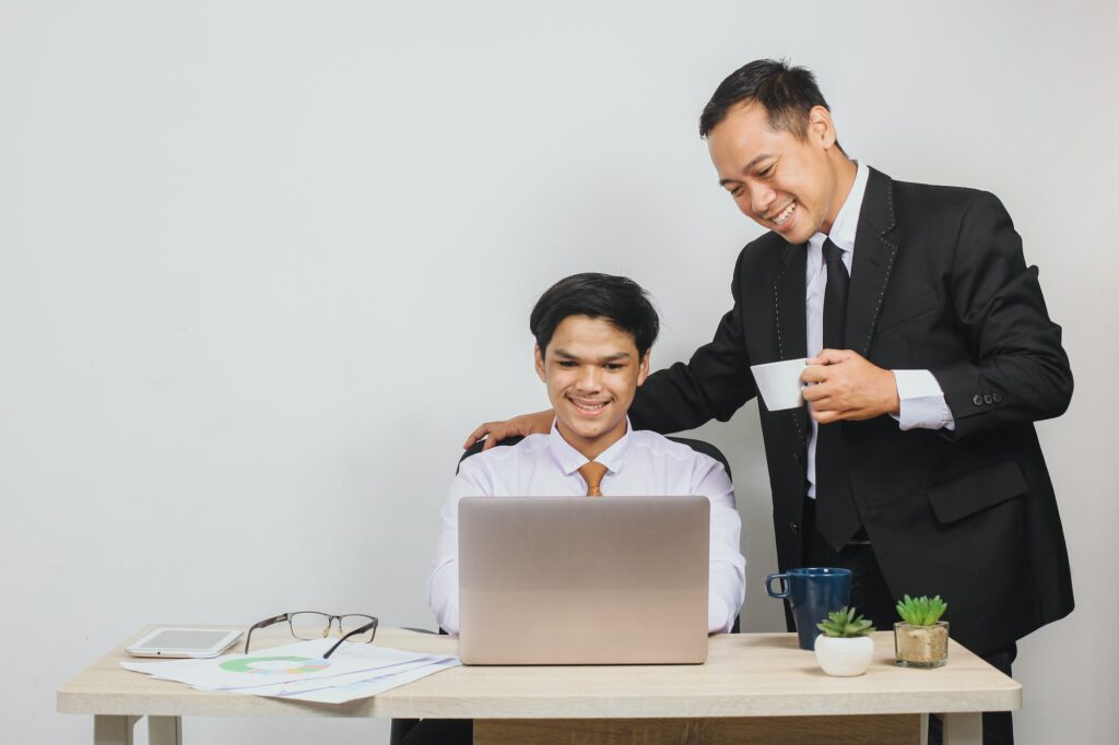 Asian boss and employee