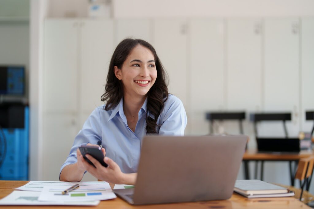 Beautiful Businesswoman completes KYC using an online banking program in order to open a digital