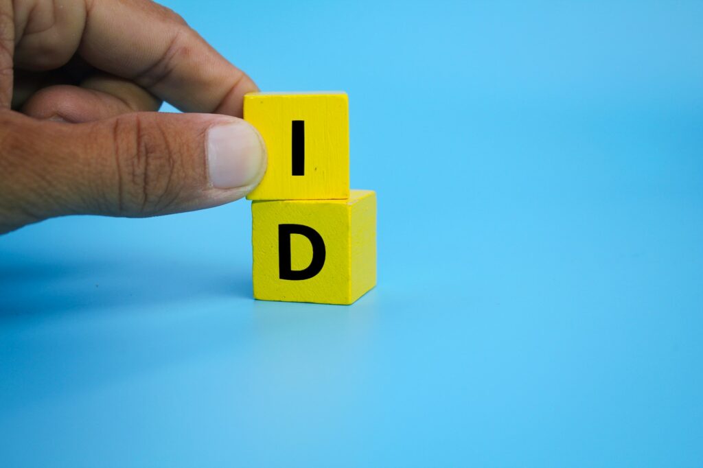 yellow cube with the letter ID or identification